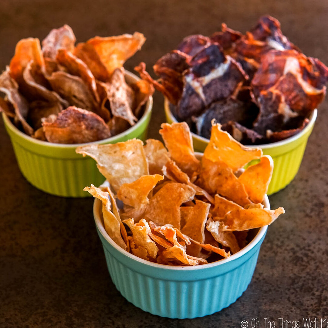 turkey, pork, and beef meat chips in colorful bowls